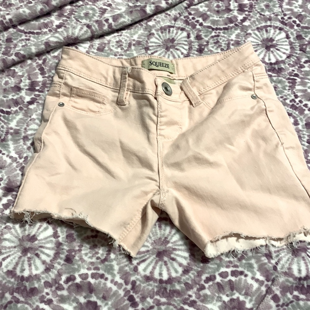 You can't really see it in the picture but the shorts are pink